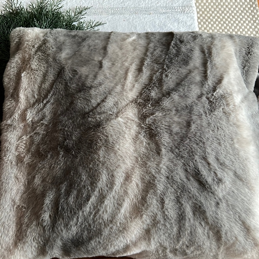 1. Grey & white faux fur throw 2. Tan & cream 3. Mauve